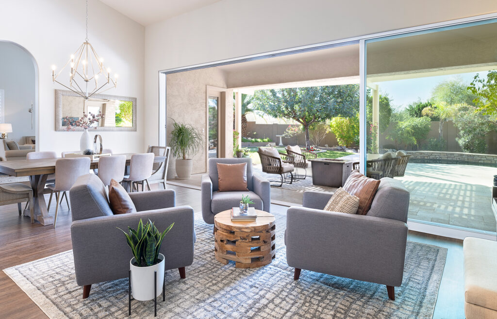 Light filled family room open to patio